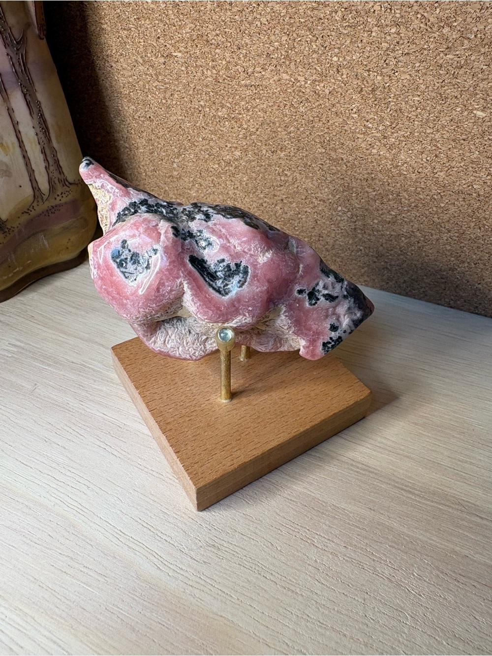 Rhodochrosite Specimen on Wood Stand